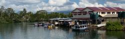 Market buildings hanging over the Labasa River